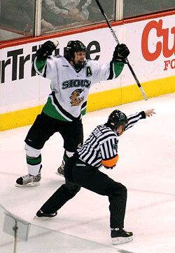 UND's Taylor Chorney celebrates his tying goal in the third period (photo: Tim Brule).