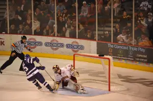 Marc Cheverie stops Jay Silvia's shot to win the shootout for Denver. Photo by: Candace Horgan