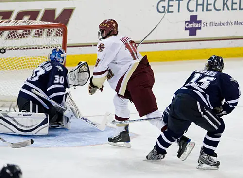 Jimmy Hayes watches his shot sail past Matt DiGirolamo for his first of three goals. Photo by Melissa Wade.