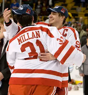 Matt Gilroy gives Kieran Millan a hug after the handshake line (photo: Melissa Wade).