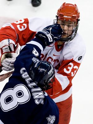 Greg Collins and Colin Wilson tangle en route to double minors and 10-minute misconducts for each (photo: Melissa Wade).