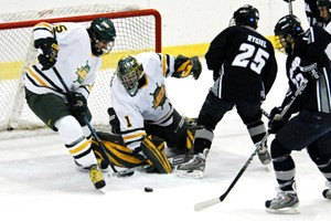 Oswego's Tim Potter making one of his 27 saves against Geneseo (photo: Angelo Lisuzzo).