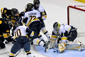 Ross MacKinnon makes one of his 24 saves for the win  (photo: Angelo Lisuzzo).