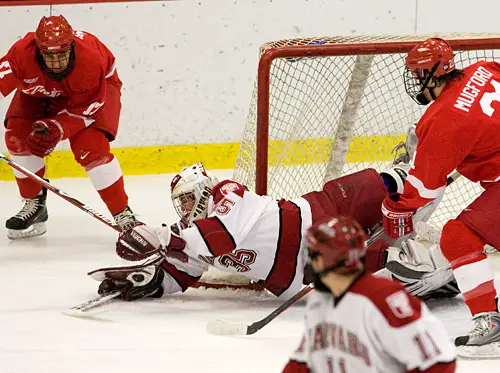 Ryan Carroll makes a diving save, one of 42 on the evening.