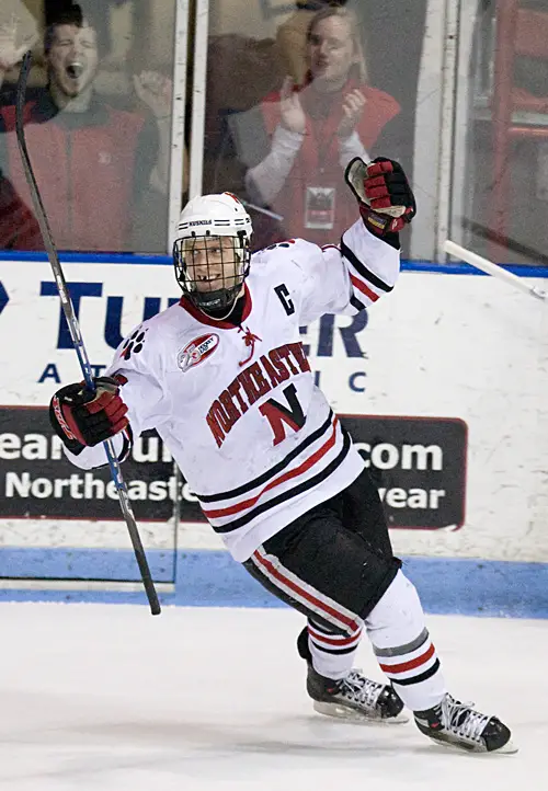 Joe Vitale celebrates Guzior's tying goal.