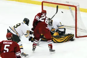 Plattsburgh's Joey Wilson (28) scores the game's first goal in the second period (photo: Angelo Lisuzzo).