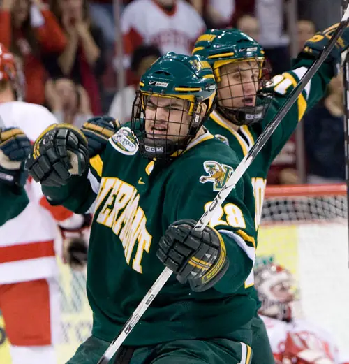 Dan Lawson (28) celebrates Dan Lawson's goal which put Vermont up 2-1 with one minute left in the first period. Photo by Melissa Wade.