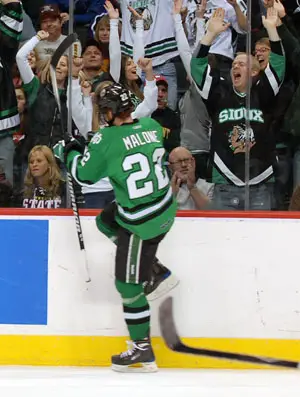 Brad Malone celebrates his third-period, shorthanded goal -- set up by Evan Trupp (photo: Tim Brule).