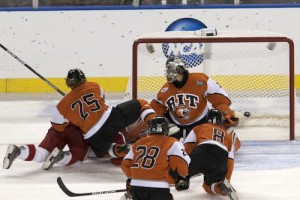 Wisconsin scores in the third period of an 8-1 victory over RIT (photo: Jim Rosvold).