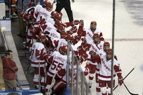 Wisconsin celebrates a goal in its 8-1 victory over RIT (photo: Jim Rosvold).