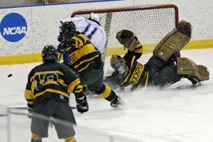 Todd Sheridan makes one of his spectacular saves for Brockport. Photo by Angelo Lisuzzo.