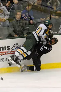 Oswego and Bowdoin got physical early in the game (photo: Angelo Lisuzzo). 