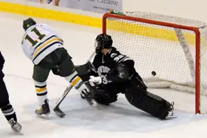 Oswego's Neil Musselwhite scores a spectacular score to tie the game at one (photo: Angelo Lisuzzo).