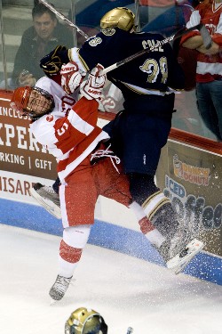 Boston University's Dave Warsofsky and Notre Dame's Ian Cole collide (photo: Melissa Wade).