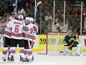 UNO celebrates Johnnie Searfoss's second-period goal against Clarkson (photo: Michelle Bishop). 