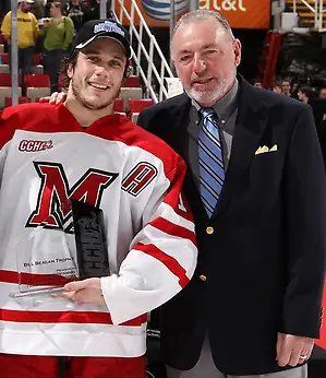 Former CCHA commissioner Bill Beagan with Miami's Andy Miele. (Dave Reginek)