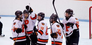 Brianna Leahy (Princeton - 15), Gabie Figueroa (Princeton - 21), Sally Butler (Princeton - 10), and Rose Alleva (Princeton - 25) congratulate Olivia Mucha (Princeton - 22) on her second goal of the game. (Shelley M. Szwast)