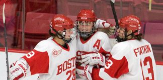 Louise Warren (BU - 28), Marie-Philip Poulin (BU - 29) and Kaleigh Fratkin (BU - 13) celebrate Poulin