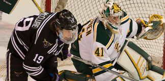 8 Jan 16: Brad McClure (Minnesota State - 19), Ate Tolvanen (Northern Michigan - 41). The Minnesota State University Mavericks host the Northern Michigan University Wildcats in a WCHA conference matchup at Verizon Wireless Center in Mankato, MN. (Jim Rosvold)