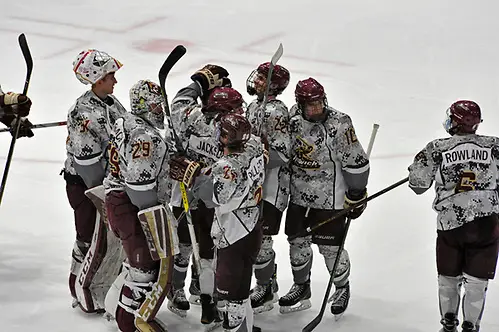 Norwich celebrates its win over Adrian in OT. (Angelo Lisuzzo)