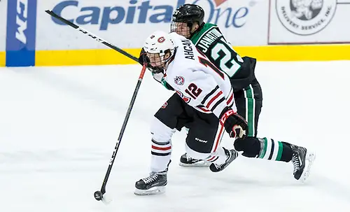 Jack Ahcan (SCSU-12) Joel Janatuinen (North Dakota-25) 16 November 18 University of North Dakota and St.Cloud State University meet in a NCHC conference contest at Herb Brooks National Hockey Center (Bradley K. Olson)