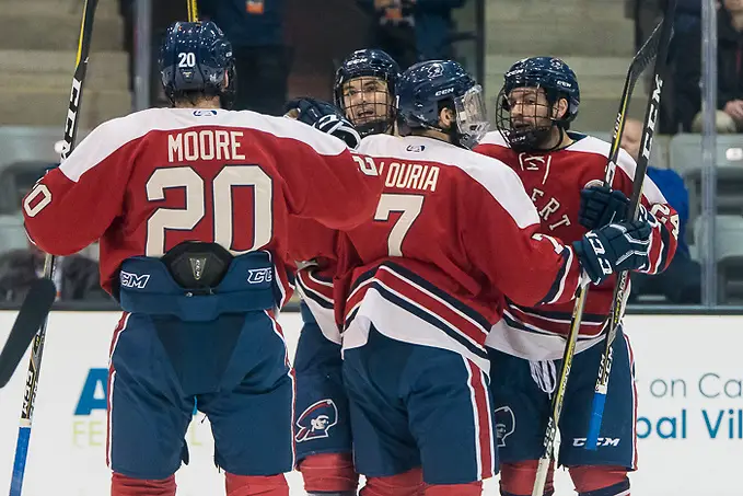 Robert Morris players celebrate a goal by Brady Ferguson (12 - Robert Morris) (2017 Omar Phillips)