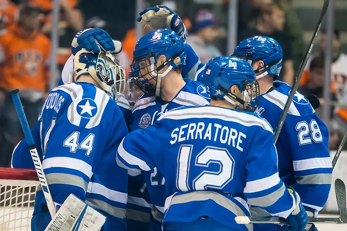 Air Force players celebrate a 2-1 win at RIT (2018 Omar Phillips)