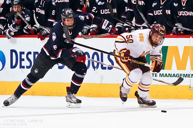 2016Jan10: Eric Rivard (ASU - 50), David Drake (UConn - 5). The UConn Huskies shut out the Arizona State Sun Devils 3-0 in the Consolation Game of the inaugural Desert Hockey Classic at Gila River Arena in Glendale, AZ. (©Rachel Lewis)