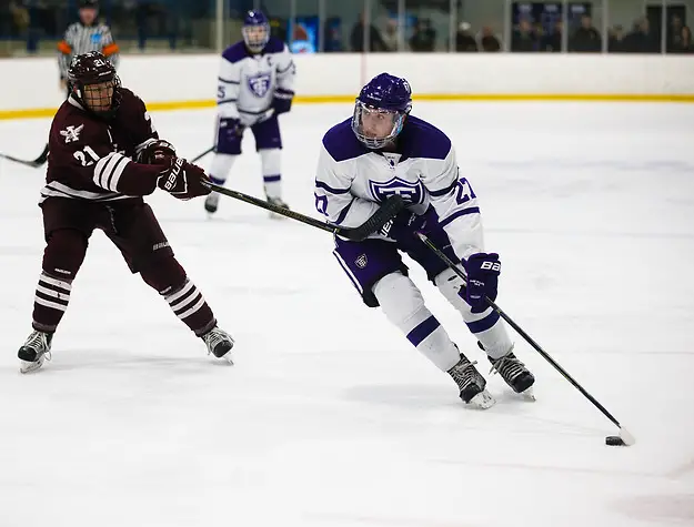 Brett Gravelle skates past a defender during a men's hockey MIAC Championship game versus Augsburg March 4, 2017 at the St. Thomas Ice Arena in Mendota Heights. The Tommies fell to the Auggies 2-3. (Mike Ekern/University of St. Thomas)