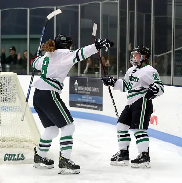 Ellen Carter (8) and Jillian Gibbs (26) of Endicott (David Le/Endicott College)