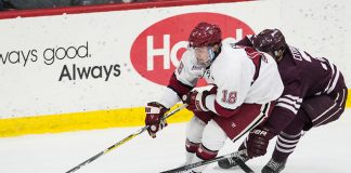 Adam Fox (Harvard - 18), Ken Citron (Colgate - 3) - The visiting Colgate University Raiders shut out the Harvard University Crimson for a 2-0 win on Saturday, January 27, 2018, at Bright-Landry Hockey Center in Boston, Massachusetts. (Melissa Wade)