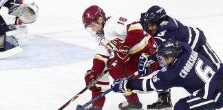 Will MacKinnon (UNH - 5), Oliver Wahlstrom (BC - 18), Angus Crookshank (UNH - 6) - The Boston College Eagles tied the visiting University of New Hampshire Wildcats 2-2 on Friday, November 16, 2018, at Kelley Rink in Conte Forum in Chestnut Hill, Massachusetts. (Melissa Wade)