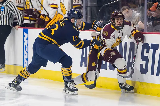 Nick Swaney (23 - Minnesota Duluth), Chase Priskie (13 - Quinnipiac) (2019 Omar Phillips)