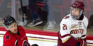 Sam Dove-McFalls (New Brunswick - 15), Christopher Grando (BC - 21) - The Boston College Eagles defeated the visiting University of New Brunswick Varsity Reds in an exhibition game on Saturday, October 6, 2018, at Kelley Rink in Conte Forum in Chestnut Hill, Massachusetts.The Boston College Eagles defeated the visiting University of New Brunswick Varsity Reds in an exhibition game on Saturday, October 6, 2018, at Kelley Rink in Conte Forum in Chestnut Hill, Massachusetts. (Melissa Wade)