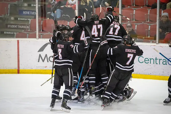 14 Dec 19: Nebraska Omaha Overtime Win Celebration. The St. Cloud State University Huskies host the University of Nebraska Omaha Mavericks in a NCHC matchup at the Herb Brooks National Hockey Center in St. Cloud, MN. (Jim Rosvold)