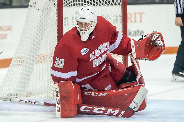 Determined Hobey Baker winner Dryden McKay riding the curve of the