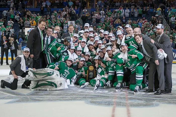 09 Apr 2016: The North Dakota Fighting Hawks celebrate winning the 2016 NCAA Frozen Four at Amalie Arena in Tampa, Florida. (Jim Rosvold)